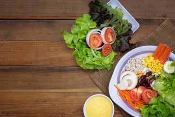 salad with mayonnaise on wood background with copy space © paisan1leo