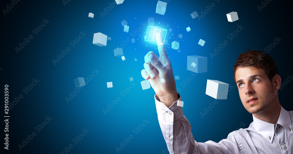 Aufkleber Man touching hologram screen displaying cube symbols