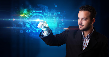 Man touching hologram screen displaying medical symbols and charts