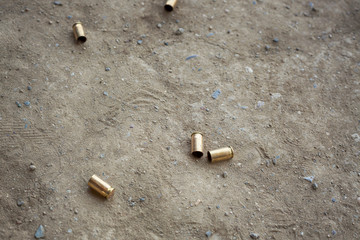 9 mm bullet shells lying on the ground