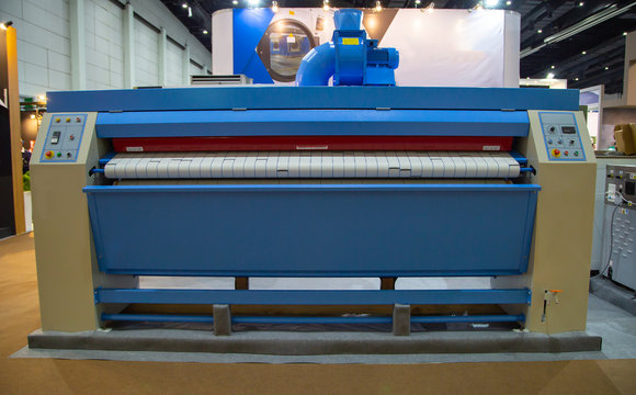 Commercial bed sheet laundry ironer flatwork equipment