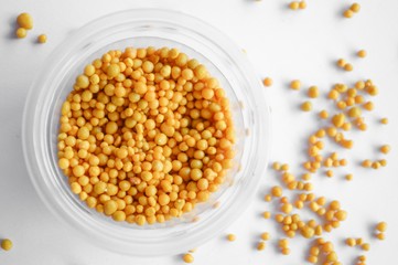 fertilizer pellets on white background