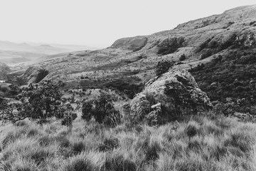 Black and white photo of the terrain in the foothills below the Drakensburg mountains near Bergville, South Africa.