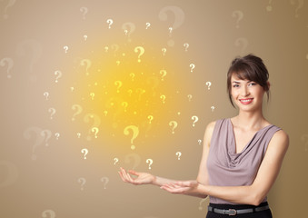 Fototapeta premium Young person presenting something with question sign concept