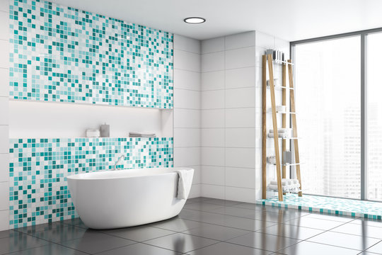 White and blue mosaic bathroom corner with tub