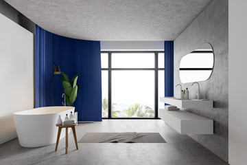 White and concrete bathroom with blue curtains