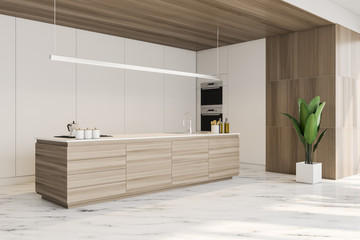 White and wooden kitchen corner with island