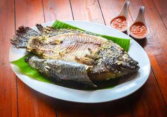 Grilled Tilapia with spicy hot sauce