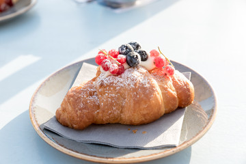 Creamy croissant with berries