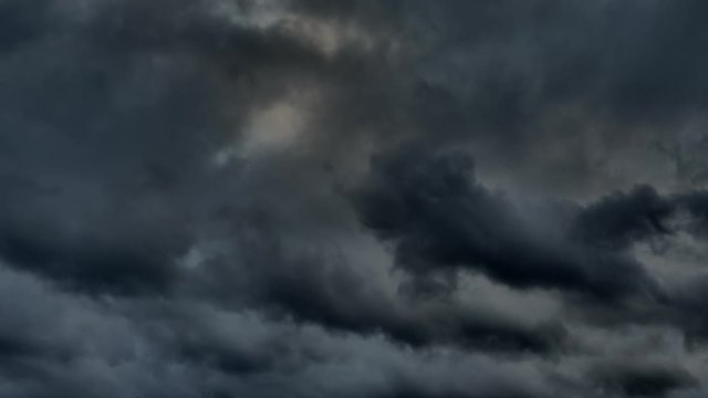 Hurricane approaching. Black clouds fly fast across the sky. Bad weather. Cyclone and rain.