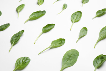 Fresh green healthy spinach on white background