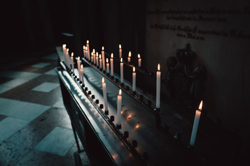 Candles in the dark catholic church