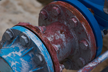 Rusty steel pipes and bolts