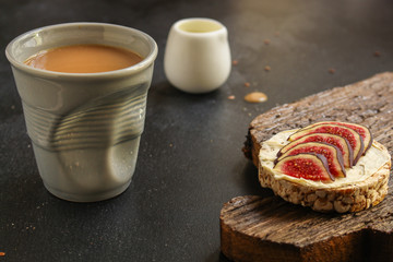 healthy food, sandwich, crisp bread, figs, coffee (breakfast or snack, cream cheese, butter, yogurt) menu concept. food background. copy space. Top view