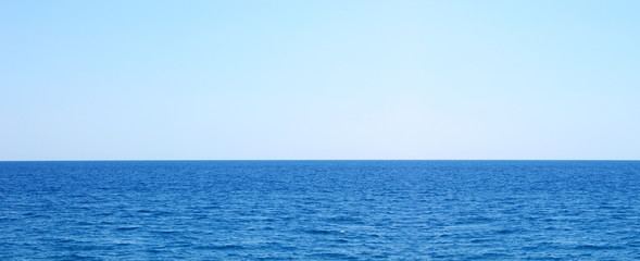 Dark blue sea and light blue sky