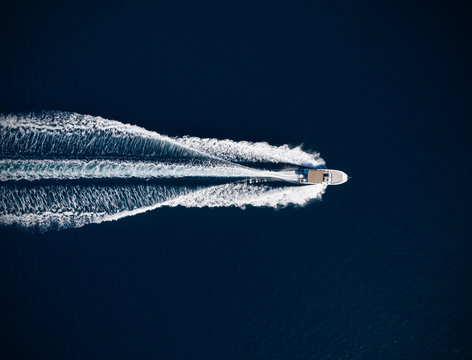 Aerial view of speed motor boat on open sea