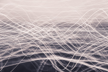 abstract long exposure light waves from street lights