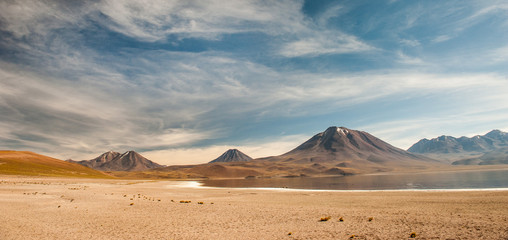 Laguna Miscanti and Laguna Miniquez in Atacama Desert. Salt lagunas and volcanos southern from San...