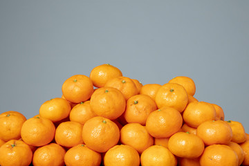 Mandarins on the grey isolated background
