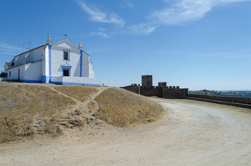 Wall and church, Medieval Castle in Arraiolos, Alentejo. Portugal.