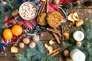 Christmas background with drink, cookies and other traditional food and symbols