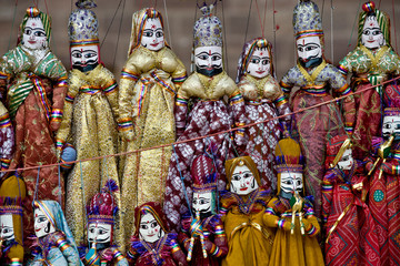 Typical handmade Rajasthan`s puppets in row