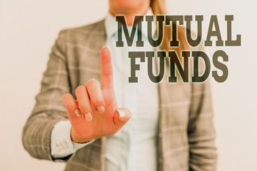 Word writing text Mutual Funds. Business photo showcasing An investment program funded by shareholders Individual Stocks Digital business concept with business woman
