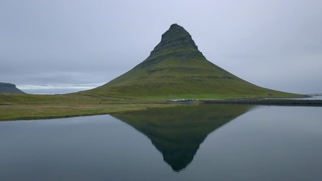 Aerial view of Kirkjufell mountain in Iceland with person