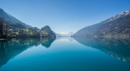 Naklejka premium The beautiful Lake Brienz from a stunning viewpoint at Iseltwald village that located om the shore at the middle of the lake. 