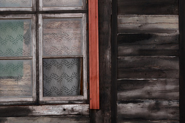 old wooden window with white curtains