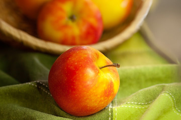 Close up of an apples on green textile