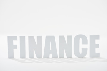 finance inscription with shadows on white background
