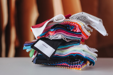 stack of fabric samples