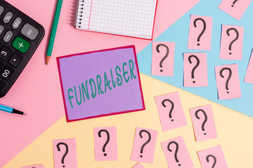 Handwriting text Fundraiser. Conceptual photo demonstrating whose job or task is seek financial support for charity Mathematics stuff and writing equipment above pastel colours background