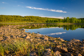 View of the lake Kovdozero in Zelenoborsky village near Kandalaksha. Kola Peninsula, Russia.