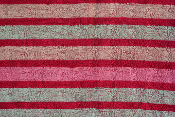 Smooth seamless texture of a striped terry towel. Colorful