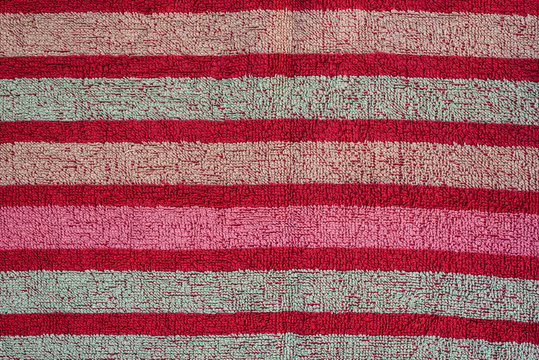Smooth seamless texture of a striped terry towel. Colorful