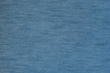 Smooth denim seamless fabric texture. Dark blue color