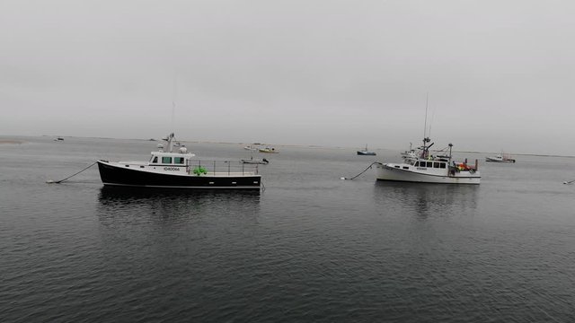 Drone footage of fishing boats near Chatham, Cape Cod.