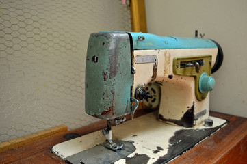 Old vintage blue sewing machine