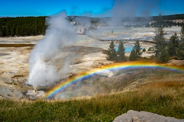 Rainbow over the Norris Geyser Basin in Yellowstone National Park, Wyoming, USA