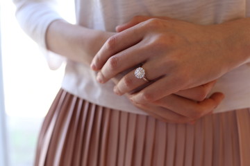 hands of a woman with wedding band