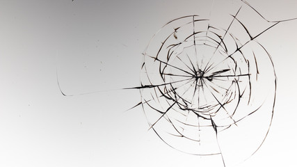 Cracked glass on a white background texture