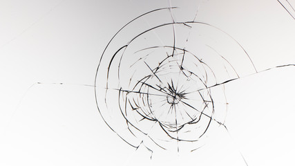 Cracked glass on a white background texture