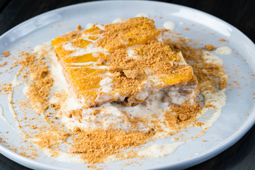 mango float, a well known easy to prepare Filipino dessert consist of cream, condensed milk, mango...