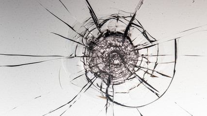 Cracked glass on a white background texture