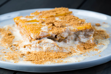mango float, a well known easy to prepare Filipino dessert consist of cream, condensed milk, mango and graham crackers