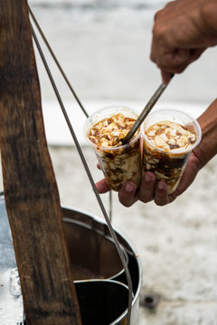 a cup of silken soy milk with muscuvado sugar and sago also known as taho