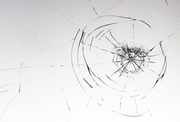Cracked glass on a white background texture