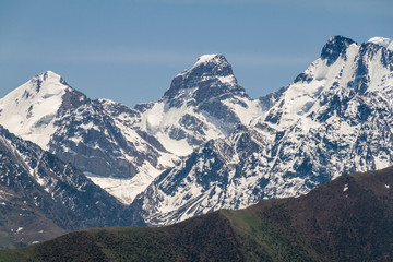Steep snow covered mountains of Ala-Too Range, Kyrgyzstan